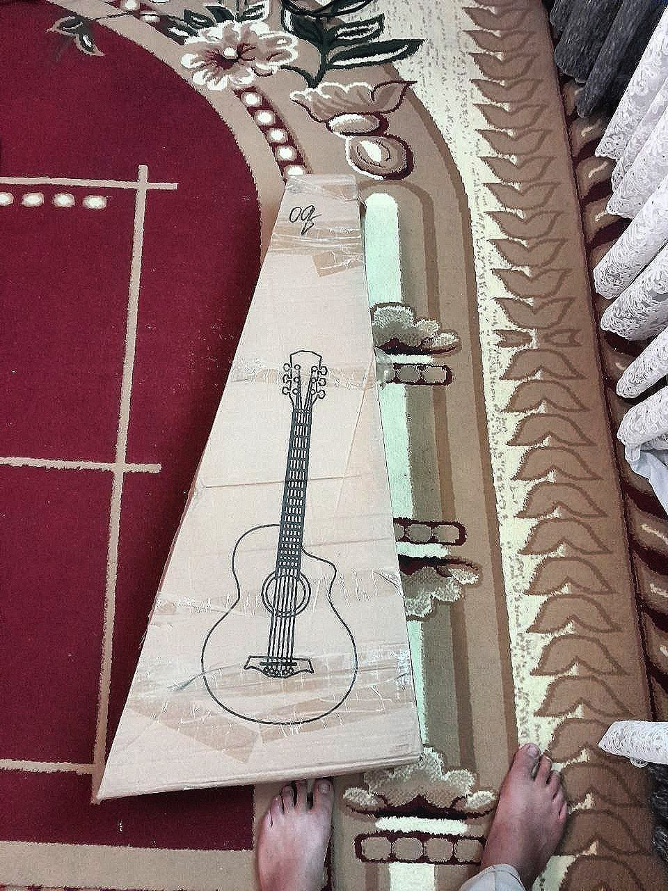 Yengi gitara chalinmagan