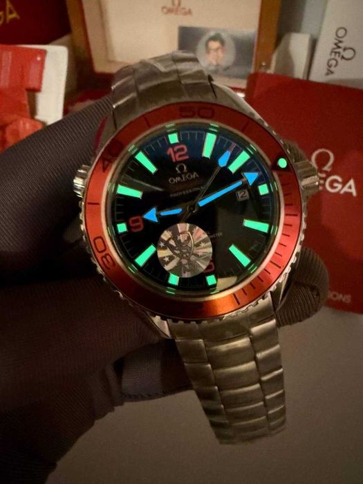 omega seamaster planetocean сребристо / оранжево
