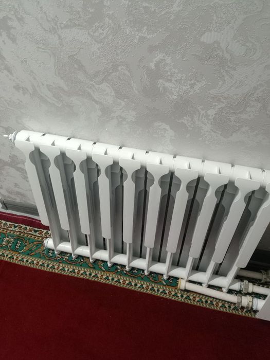 Продаю две десяти секционные радиаторы,новые, отличного качества по ли