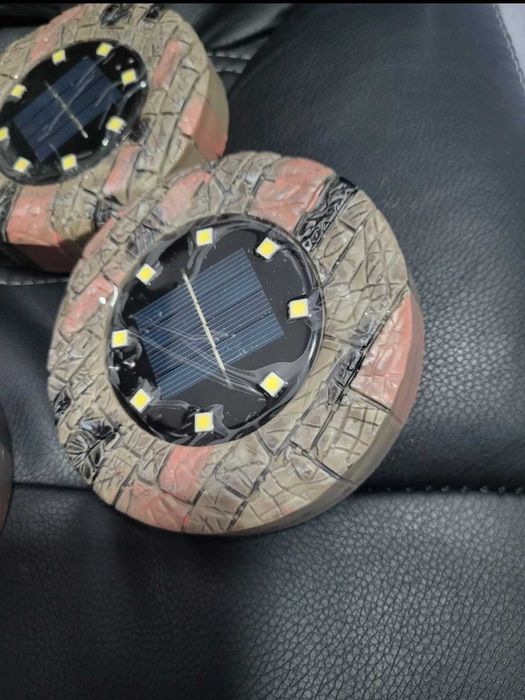 Set 4 lampi solare cu aspect de piatra cu 8 LED-uri