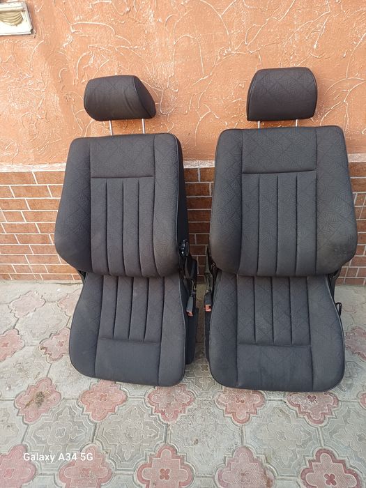 Передние сиденья w124