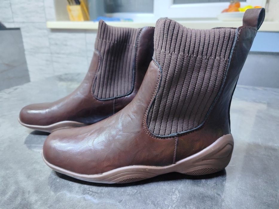 Продам новые сапоги