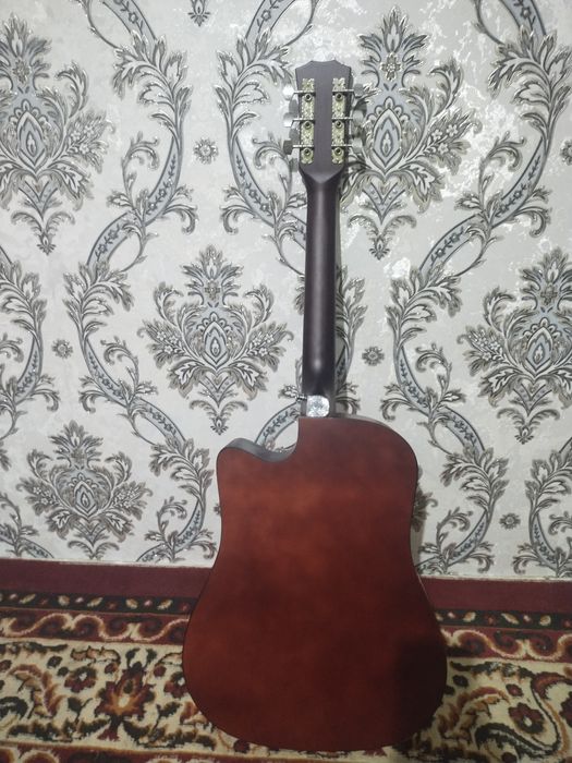 Akustik gitara Yangi