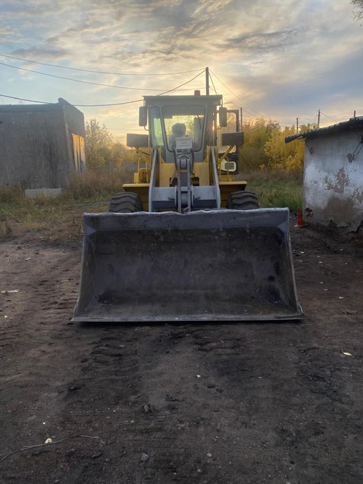 Продается погрузчик двухкубовый фронтальный