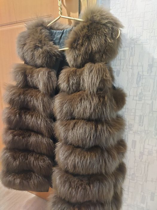 Продам меховую желетку