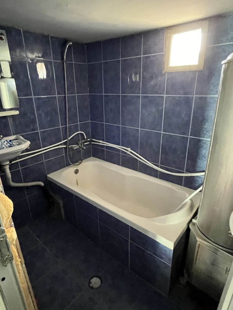 Casa la tara cu gradina