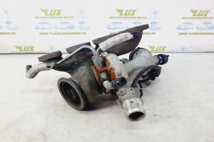 Turbo turbina 1.4 benzina a14net 55565353 781504-7 Opel Astra J  [din 2009 pana  2012] seria
