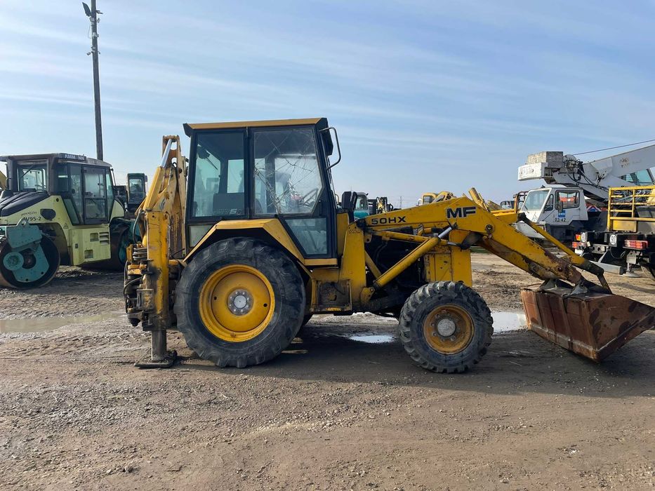 Dezmembrez buldoexcavator Massey Ferguson MF 50HX