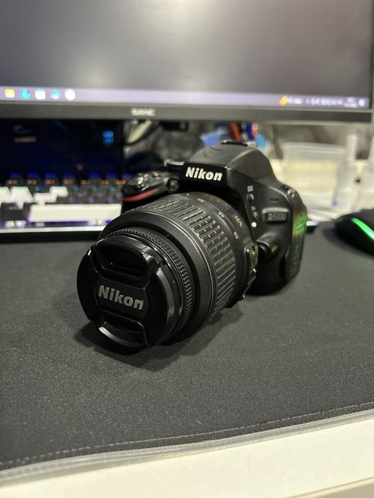 Продам фотокамеру Nikon D5100 Kit 18-55 II черный