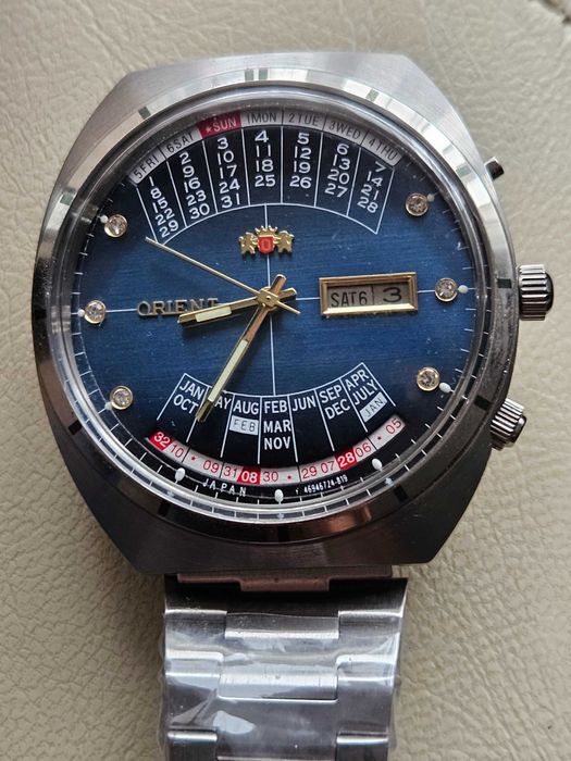 Ceas  orient  multicalendar  automatic .