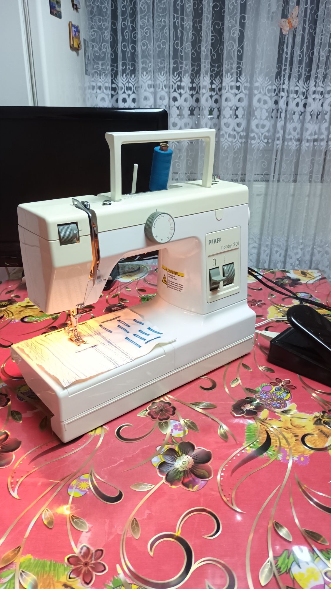 Masina de cusut PFAFF HOBBY cu butoniera automata si multiple operații