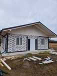 Case și garaje pe structură metalică cu băieții din