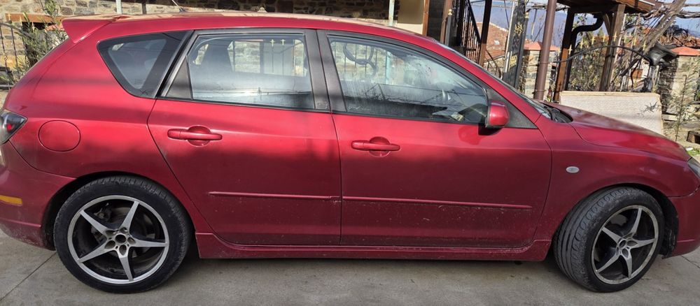 Мазда 3, 2004 година