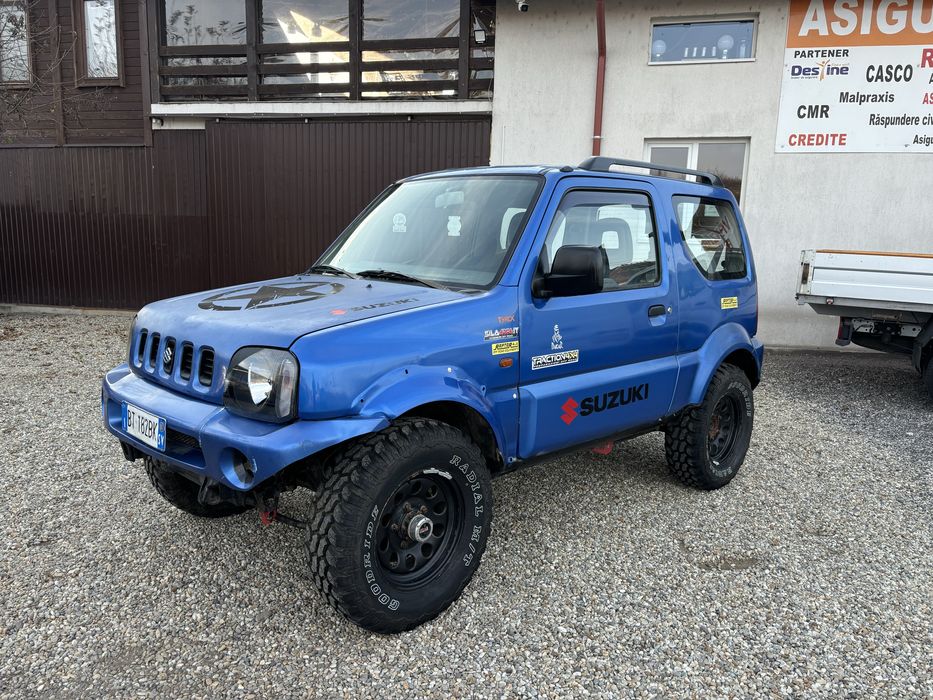 Suzuki Jimny - 1.3i - 2001 - AC - Blocant spate