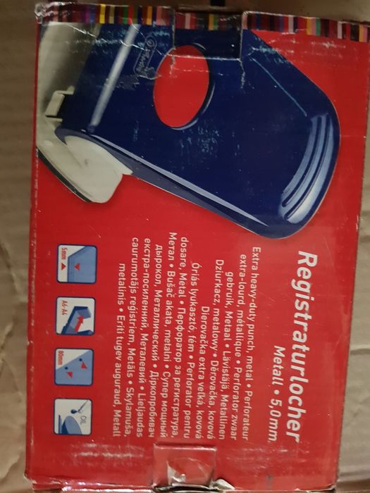 Дырокол,канцелярские принадлежности новые