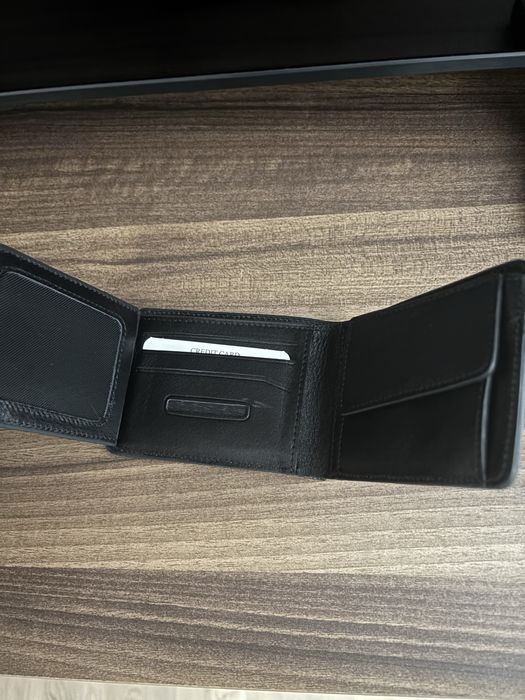 Полтфейл Gucci.