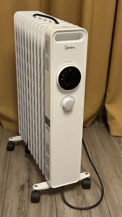 Масляный радиатор Midea NY2311-20M белый