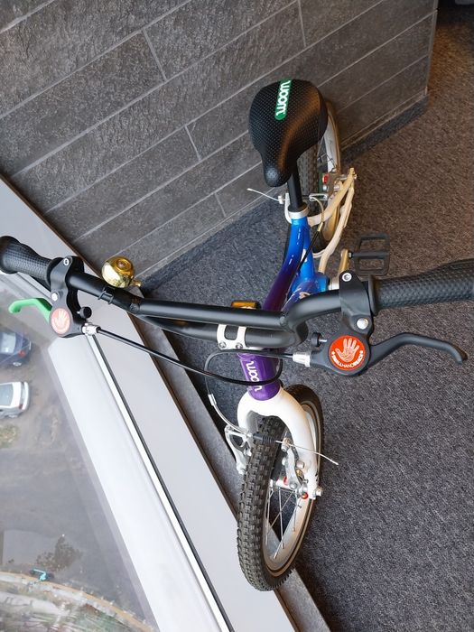 Vând bicicleta Woom 2 + casca woom XS