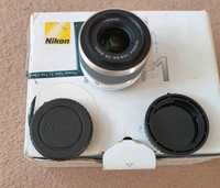 Pachet Nikon 1 - Filtru foto, cutie Nikon 1 J1 si incarcatoare Nikon 1