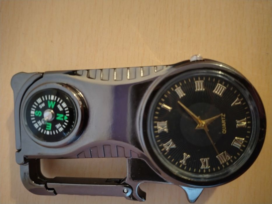 Bricheta metalica anti vânt , ceas , busola