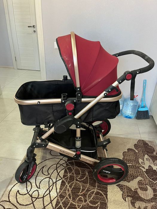 Продам коляску и стульчик для кормления