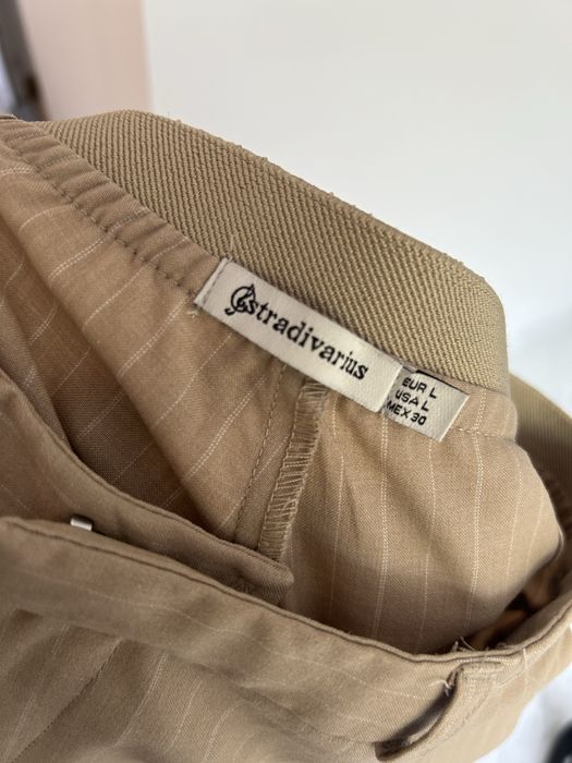 Pantaloni cu dunga Stradivarius