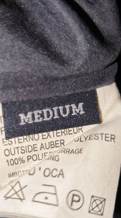 Vesta cu puf bleumarin
