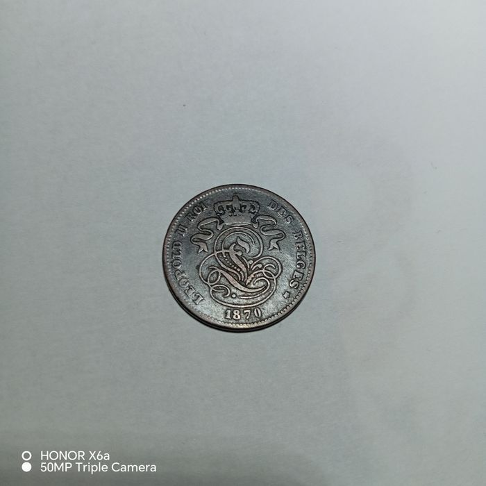 MONEDĂ BELGIANĂ DIN 1870

Monedă belgiană din 1870 cu inscripția „L'un