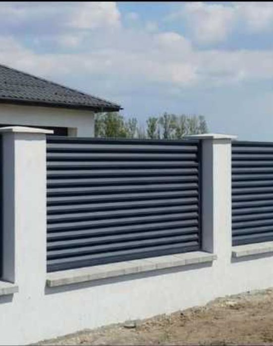 Executam garduri si porti