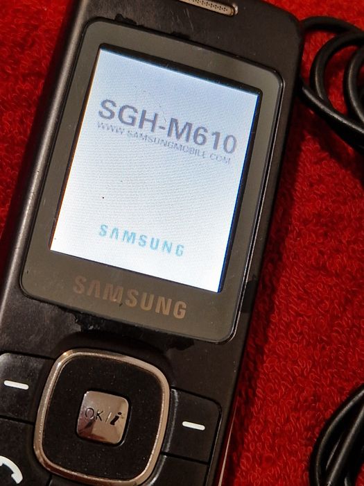 Telefon Samsung slide SGH-M610 cu încărcător original
