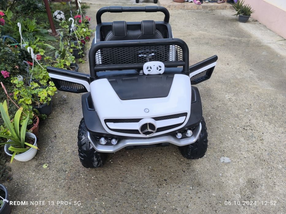 Mașinuță electrică.