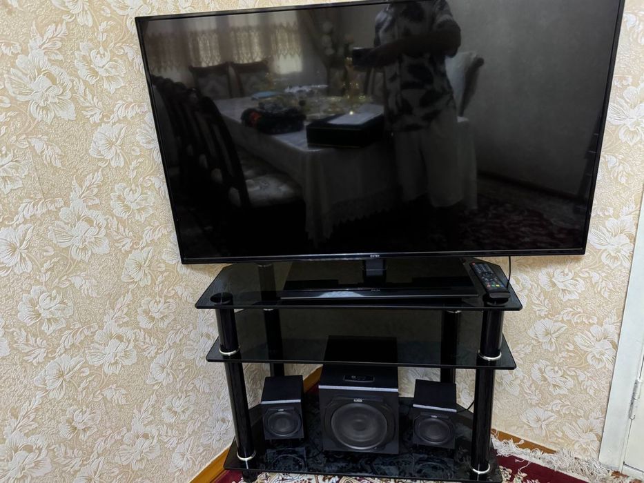 Паставка телвизорни тагидаги калонкаси билан