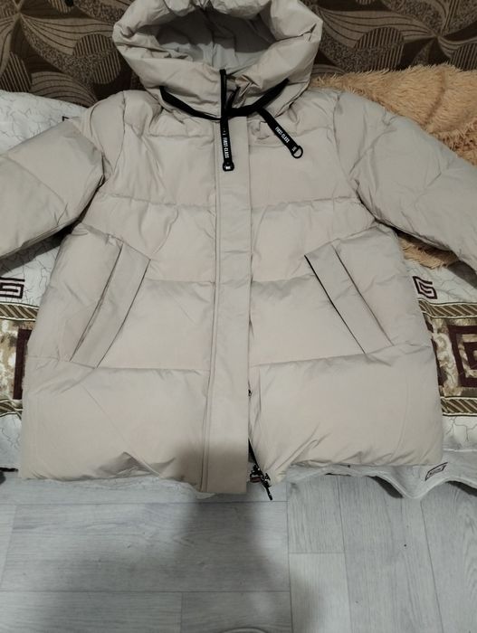 Продам зимний пуховик 50размер