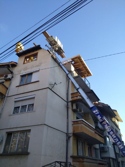 Качване и сваляне на материали мобилен асансьор