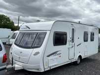 Rulota 2010 lunar lexon SI cu pat island,motor mover, cort mare etc