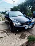 Kia cerato 1.6 105 cp