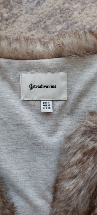 Vesta blana Stradivarius, M