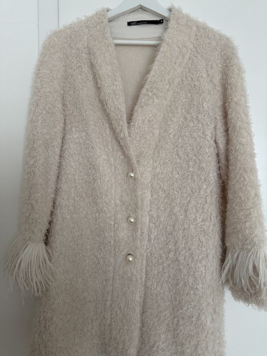 Ефектна жилетка с пера Illumminee