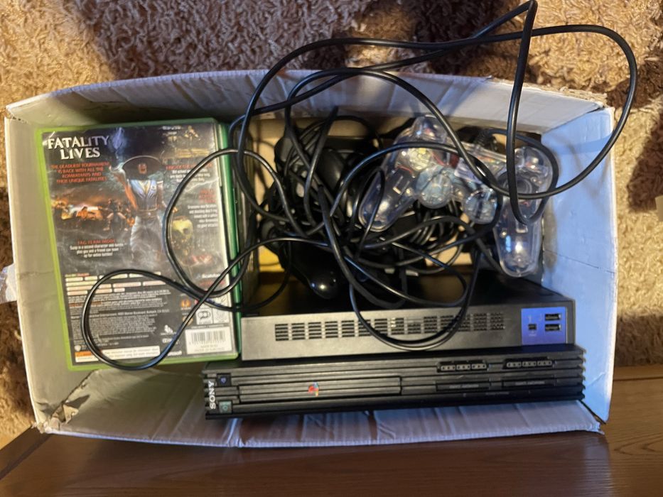 Vand consola ps 2 cu mai multe jocuri