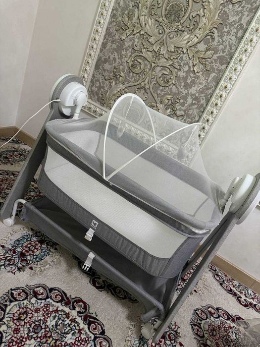 Детская кроватка качалка