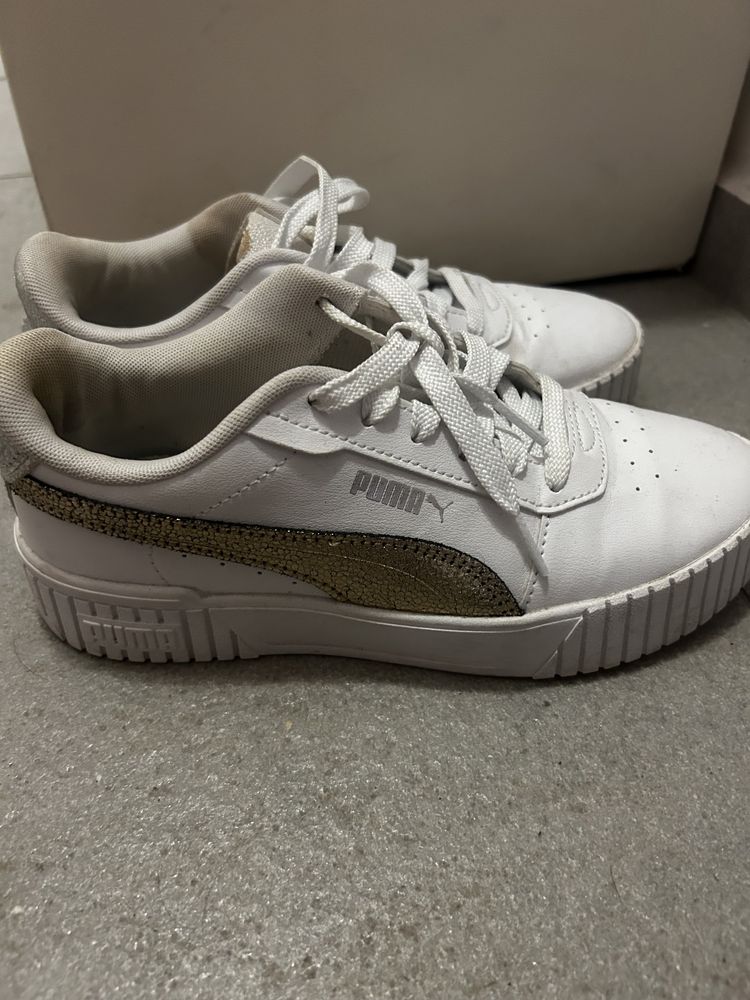 Маратонки Puma и Under Armour