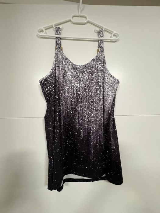 Елегантен металически потник – модерна визия