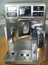 Saeco Exprelia. Кафе машината е с каничка за мляко и най-високия клас.