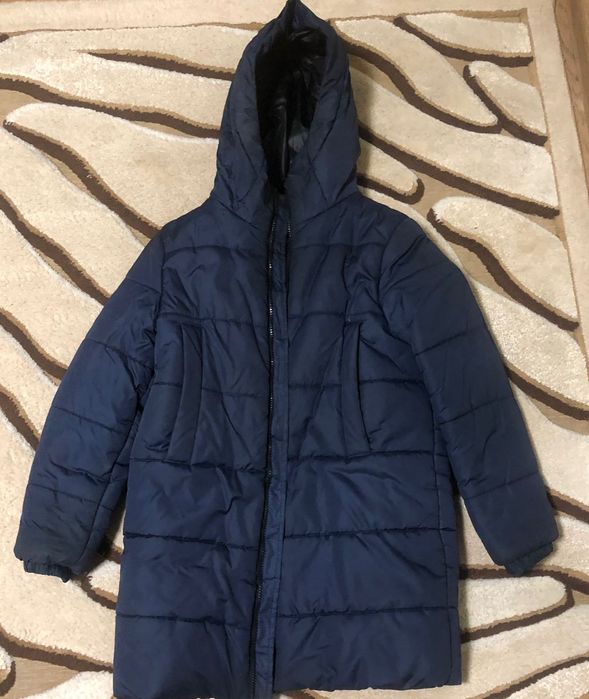 Продам зимнюю куртку на мальчика. 134-140