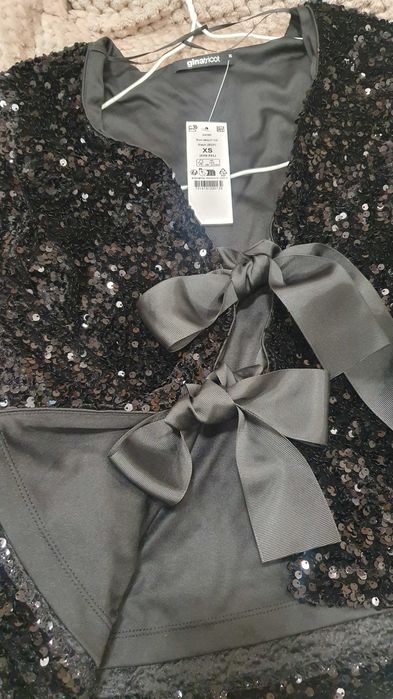 Ново дамско  сако с паети