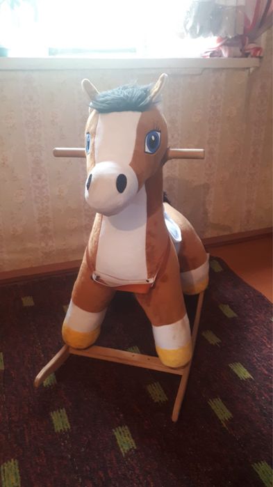 Продам игрушку лошадку