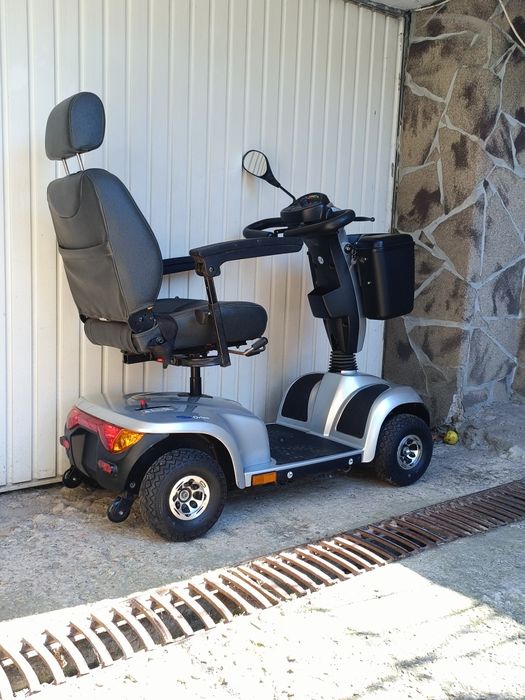 Carucior scuter electric scaun dizabilitati  carut tricieleta handicap