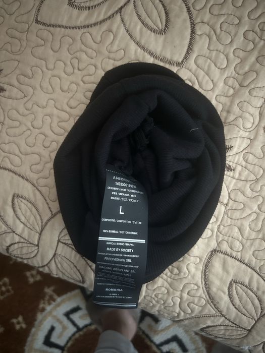 Caciula made by society