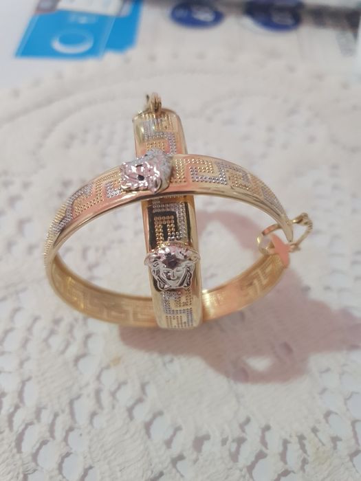 Cercei  aur 14 K Versace model foarte frumos cu aur alb .