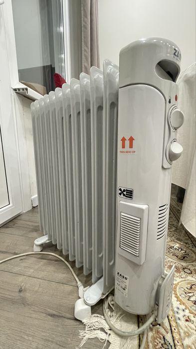 Масляный обогреватель